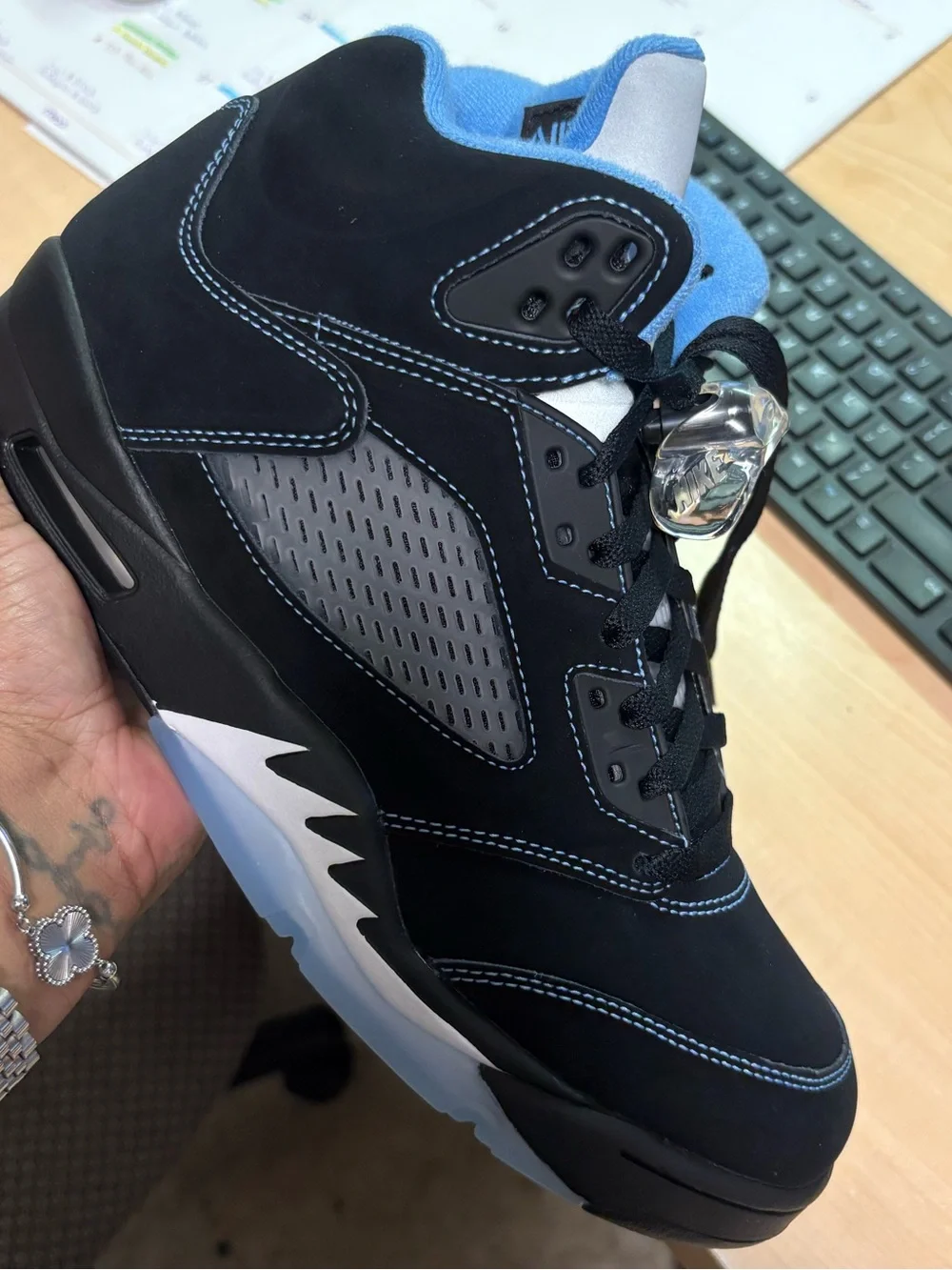 Jordan Men’s Black and University Blue Retro Basketball Shoes